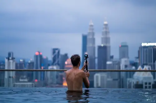 Infinity pool with view of Petronas Towers in Kuala Lumpur, Malaysia