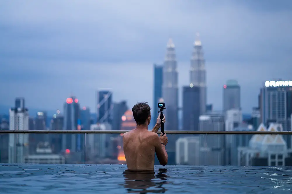 Infinity pool with view of Petronas Towers in Kuala Lumpur, Malaysia