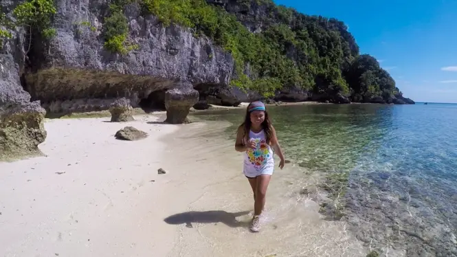 Kat in private beach in Buton Island