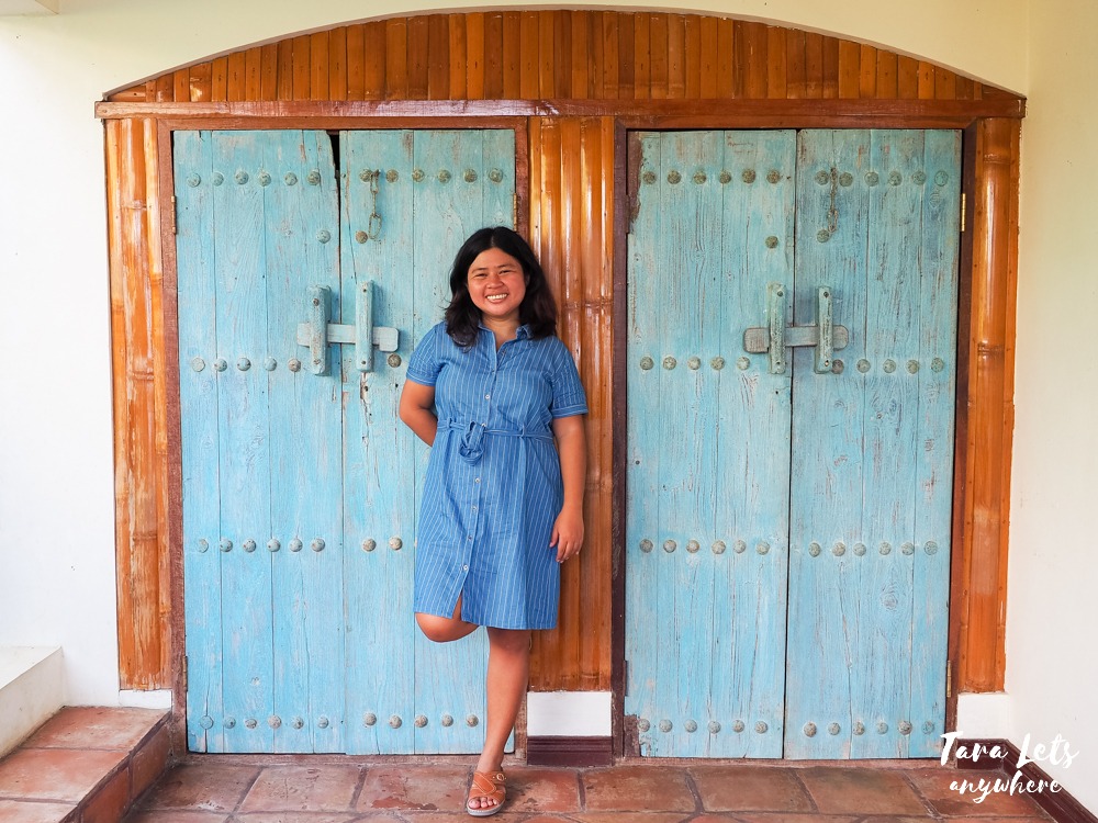 Kat in blue door in Ataalaya Farmhouse