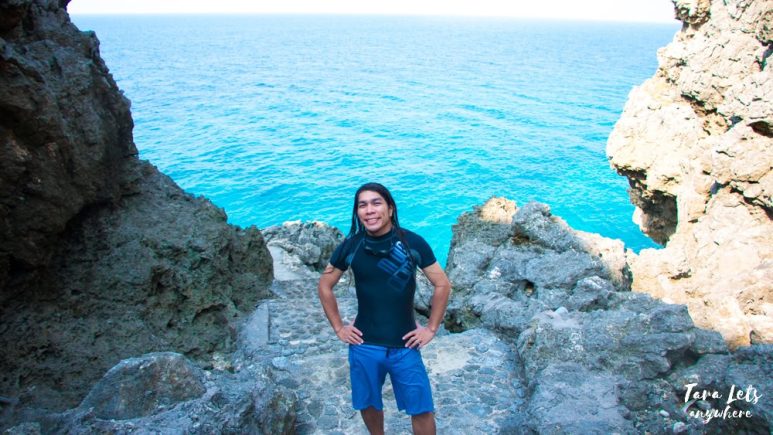 Hali at cliff jumping site in Fortune Island