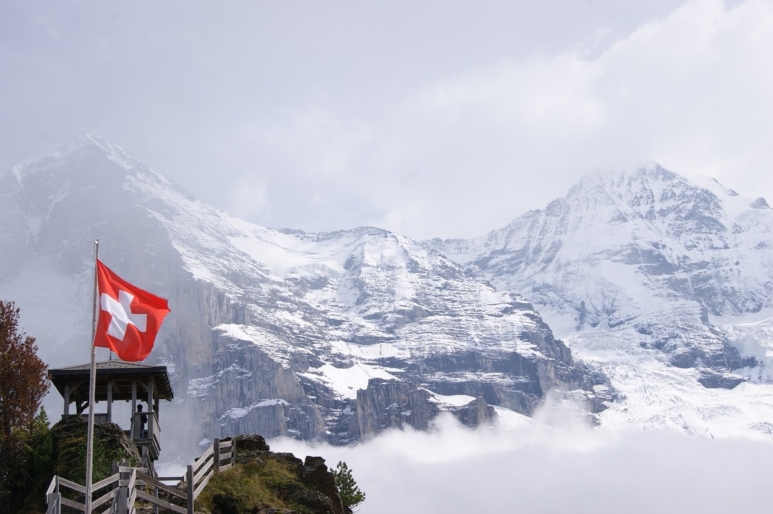Jungfraujoch Swiss flag in the Glacier Plateau