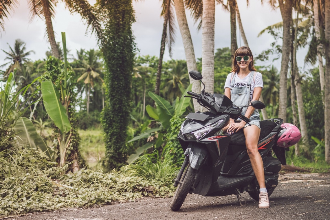 Riding a scooter - one of the best budget travel hacks