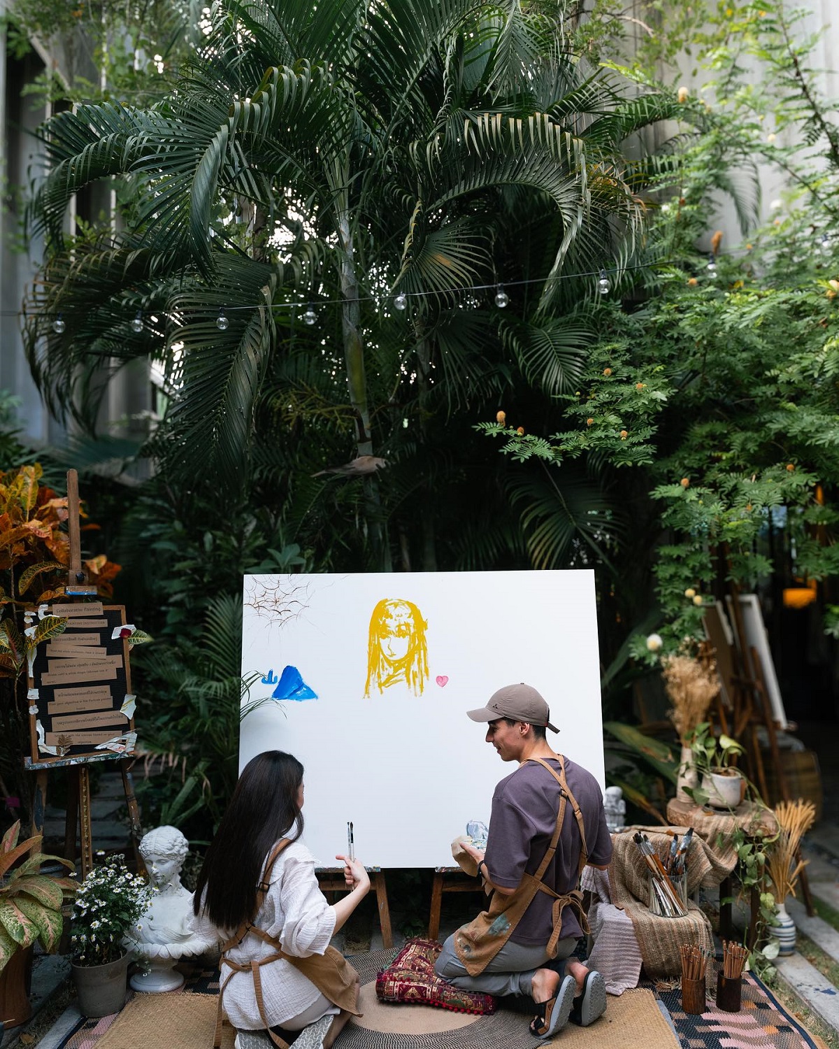 Painting in Taiban Cafe - one of the romantic things to do in Bangkok for couples